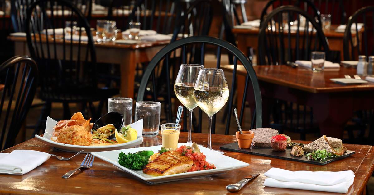 dinner food and drinks on a restaurant table